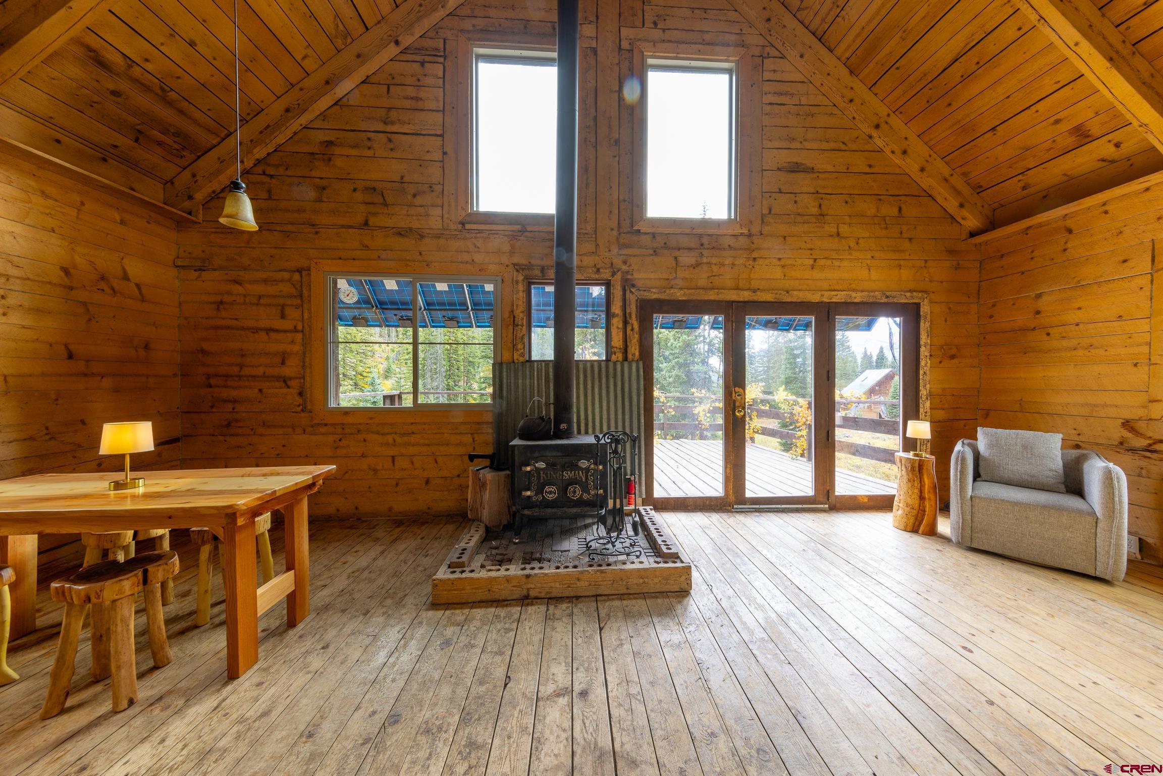 824 County Road Crested Butte, CO 81224 - Photo 4 of 39 a living room with furniture and wooden floor