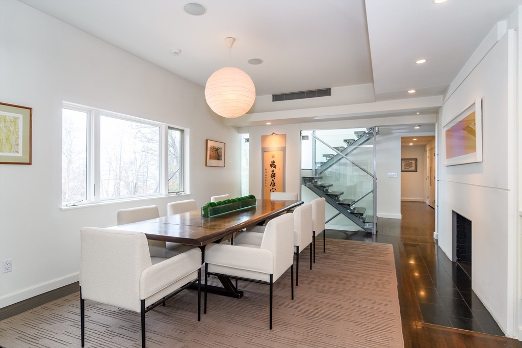 41 Grove Street Wayland, MA 01778 - Photo 4 of 24 a living room with furniture dining table and a large window