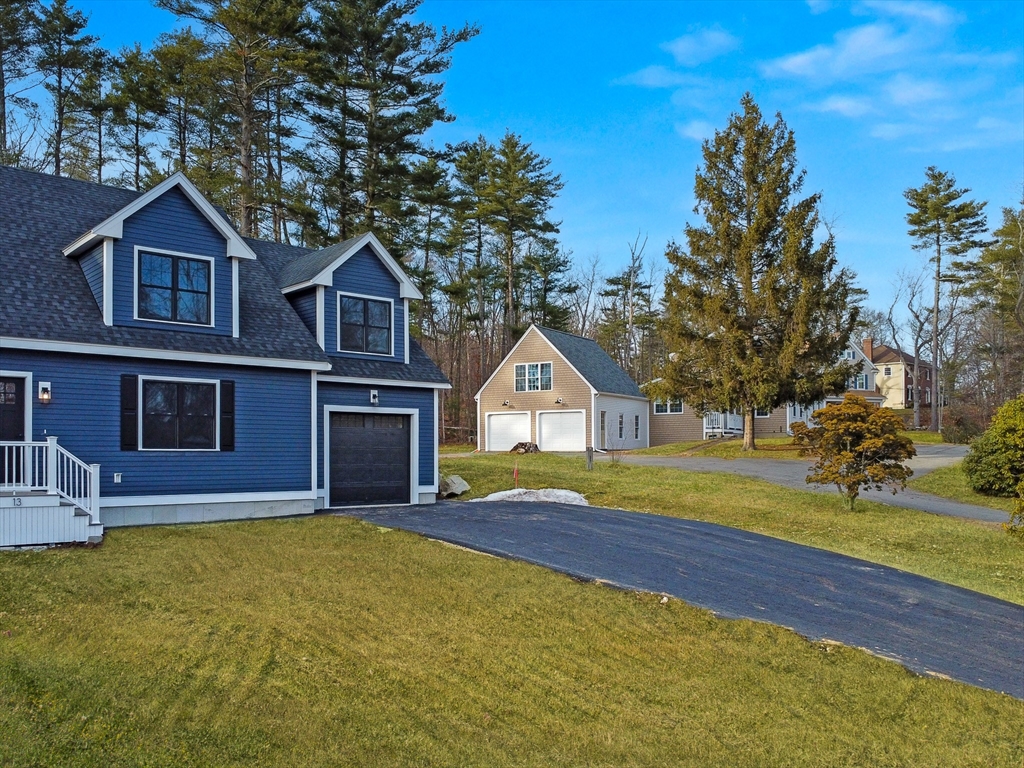 13 Main Street, Unit 13 Newbury, MA 01922 - Photo 3 of 36 a view of outdoor space yard and front view of a house