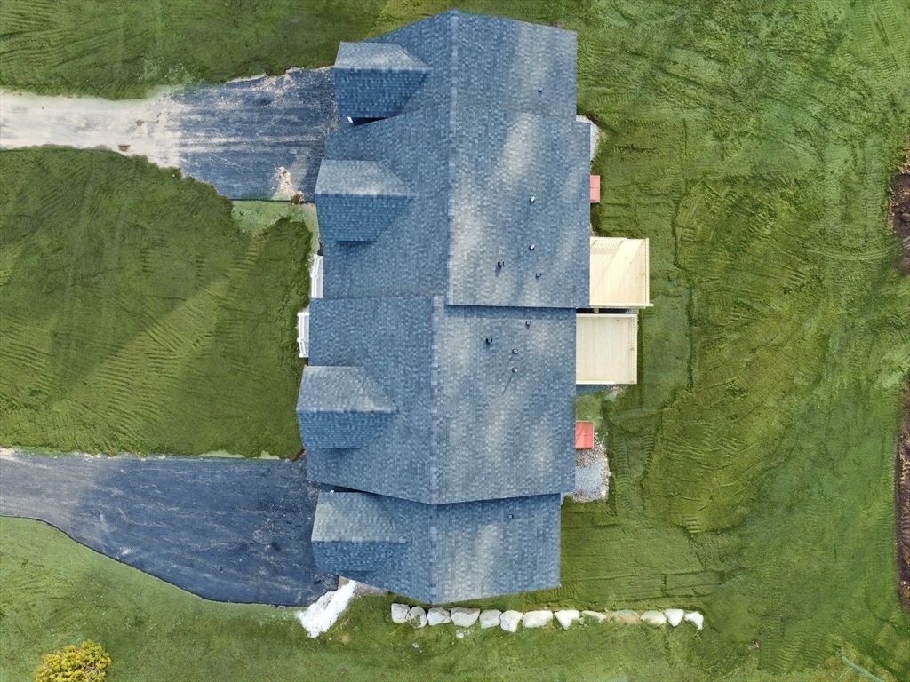 13 Main Street, Unit 13 Newbury, MA 01922 - Photo 32 of 36 an aerial view of a house with a yard