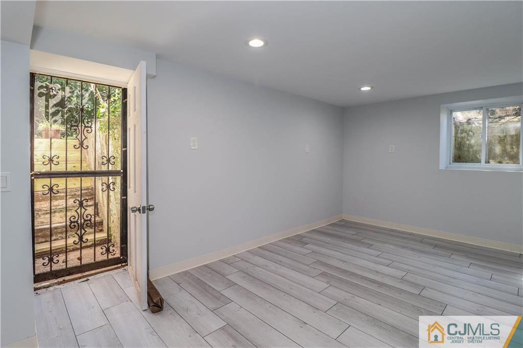 11 Brookside Road Edison, NJ 08817 - Photo 19 of 26 a view of an empty room with a window