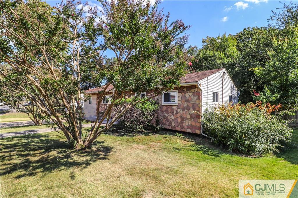11 Brookside Road Edison, NJ 08817 - Photo 3 of 26 a view of a house with a yard
