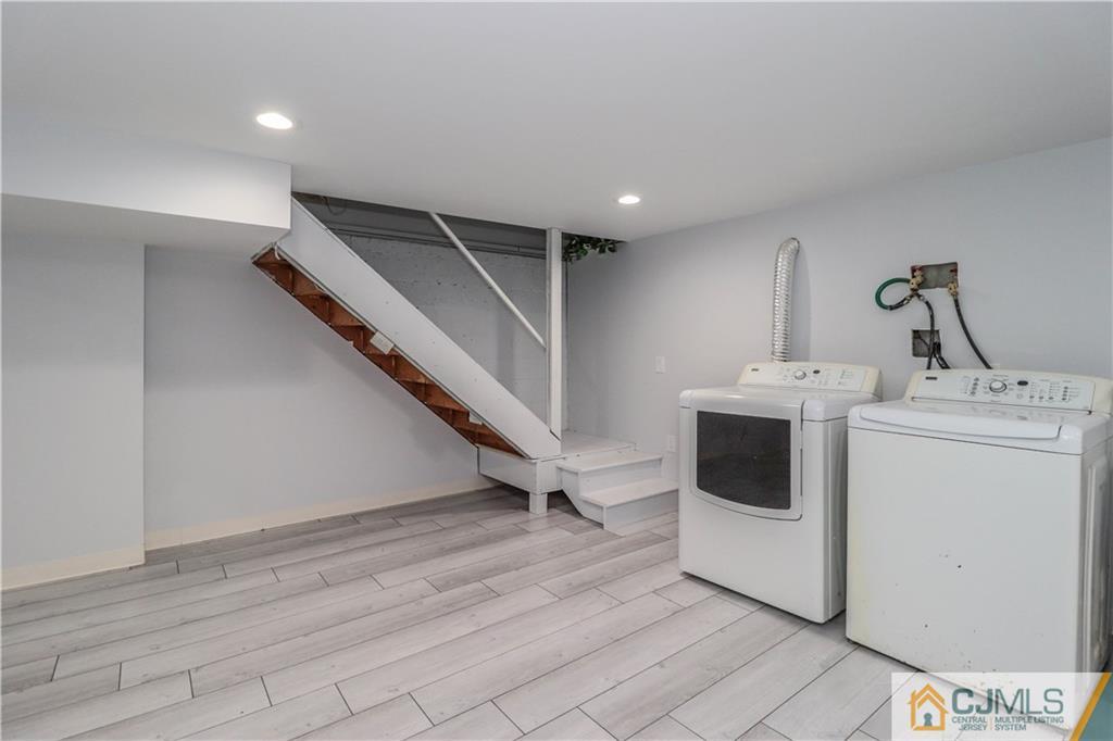 11 Brookside Road Edison, NJ 08817 - Photo 21 of 26 a utility room with dryer and washer