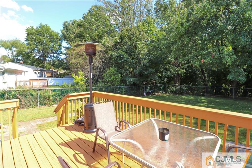 11 Brookside Road Edison, NJ 08817 - Photo 23 of 26 a view of a swimming pool with a patio and a yard