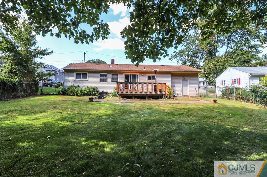 11 Brookside Road Edison, NJ 08817 - Photo 25 of 26 a view of a house with a backyard
