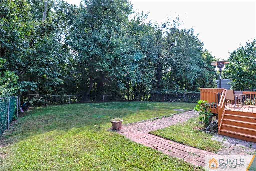 11 Brookside Road Edison, NJ 08817 - Photo 26 of 26 a view of a chair and table in the garden