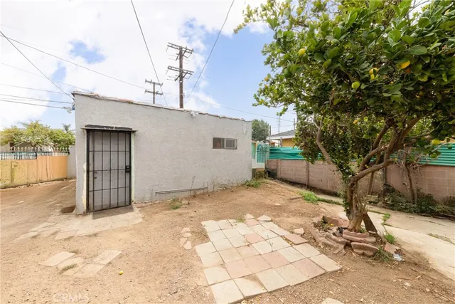 a view of a house with a snow in the yard