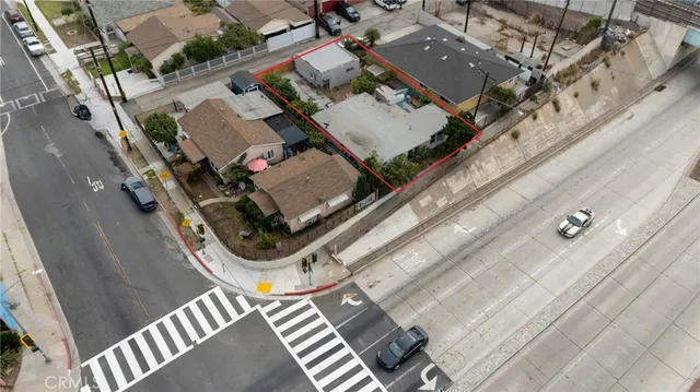 an aerial view of a house with roof deck