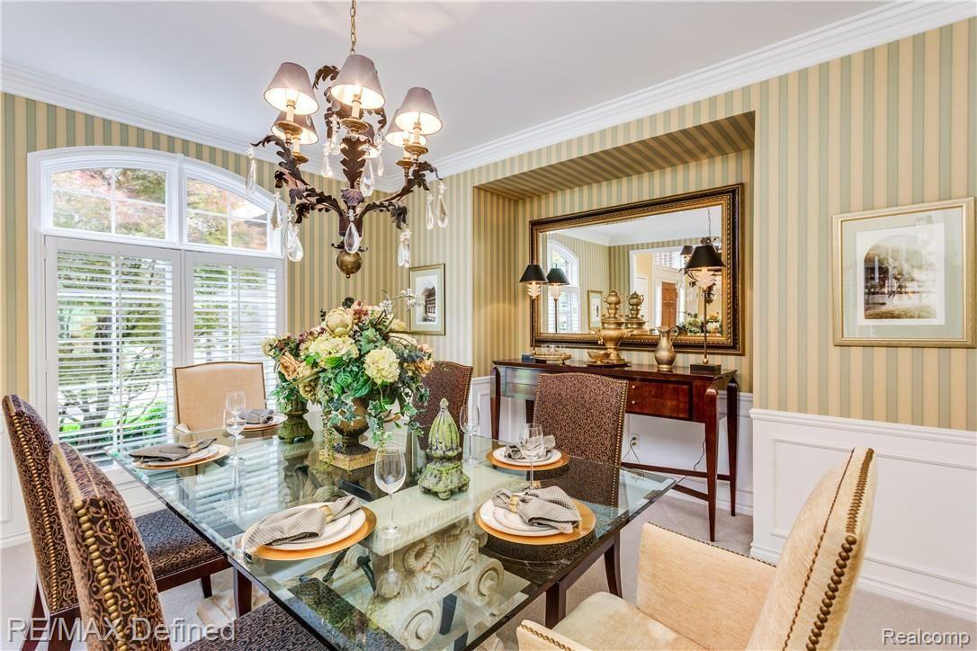 5637 Kirkridge Trail Rochester, MI 48306 - Photo 7 of 36 The spacious formal dining room has beautifully crafted wainscoting and a buffet niche.