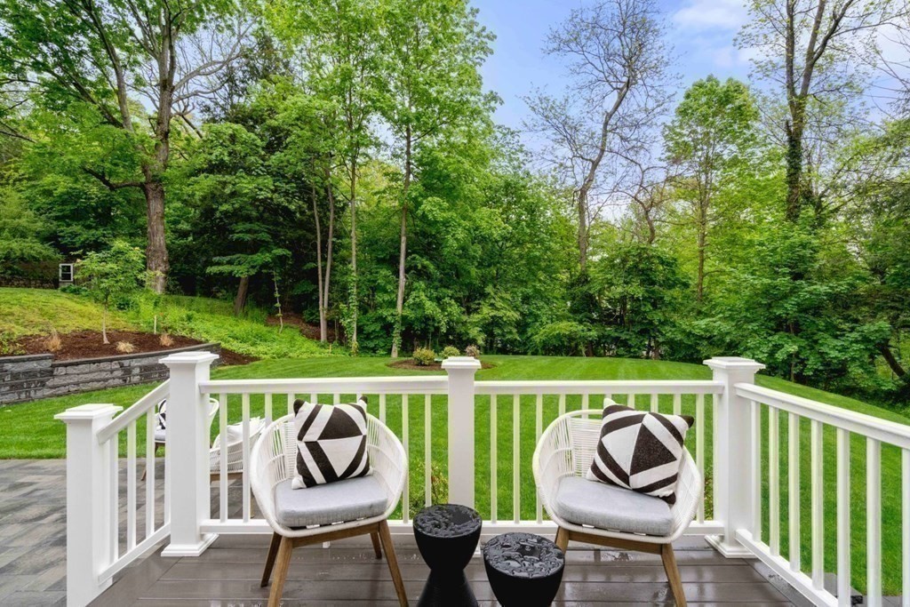 19 Hastings Road Lexington, MA 02421 - Photo 17 of 19 a view of a chair and table on the deck