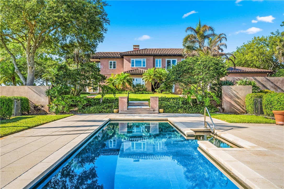 2350 Quay Dock Road Vero Beach, FL 32967 - Photo 3 of 35 a view of a swimming pool with a patio