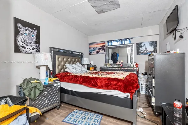 a bed room with a bed and a couch