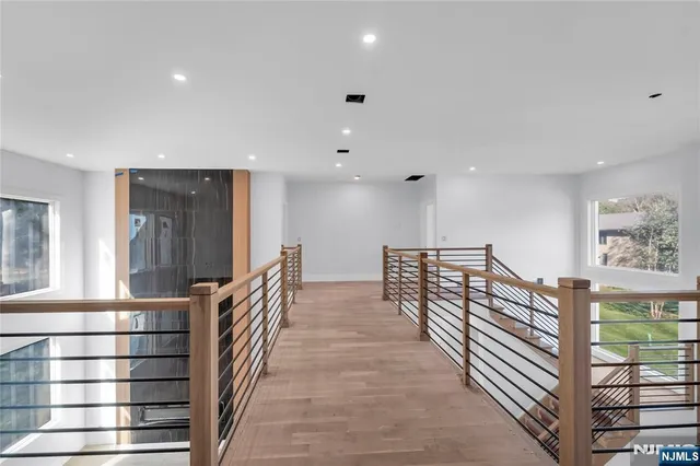 a spacious bedroom with a bed and a couch