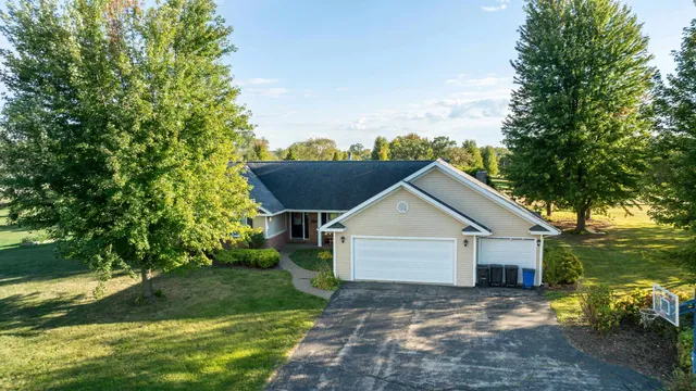 a view of a house with garden