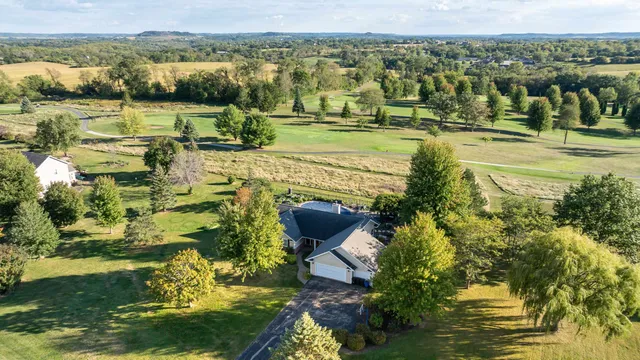 a view of a lake with a yard