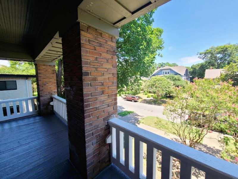 4911 Worth Street, Unit 4 Dallas, TX 75214 - Photo 11 of 28 a view of a porch with wooden floor and outdoor space