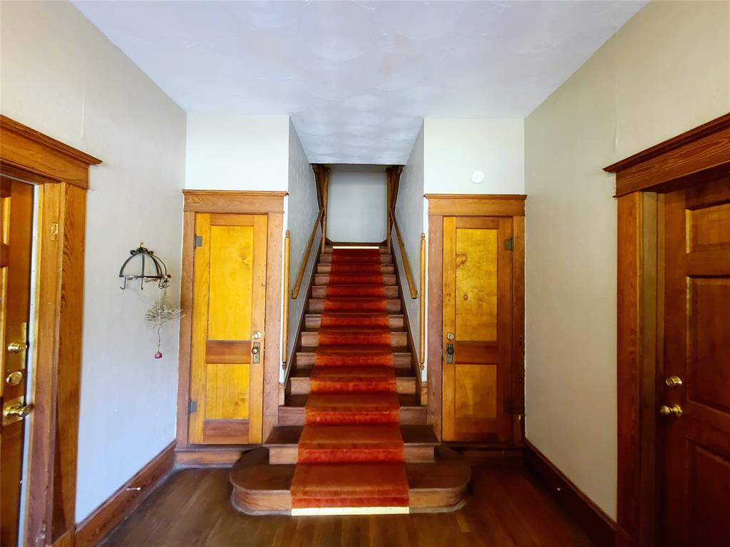 4911 Worth Street, Unit 4 Dallas, TX 75214 - Photo 4 of 28 a view of entryway and hall with wooden floor