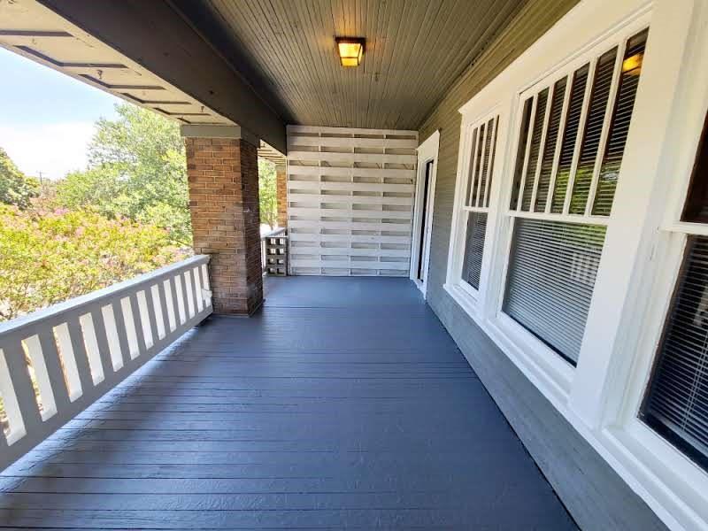 4911 Worth Street, Unit 4 Dallas, TX 75214 - Photo 10 of 28 a view of a hallway with wooden floor and staircase
