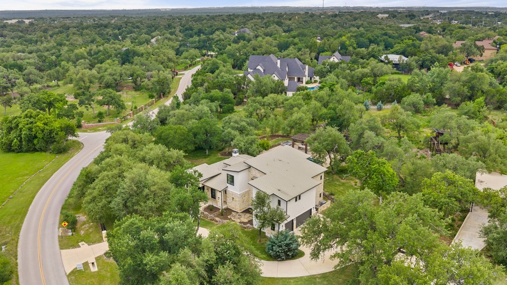 11002 Foundation Road Austin, TX 78726 - Photo 3 of 40 an aerial view of residential house with outdoor space and trees all around