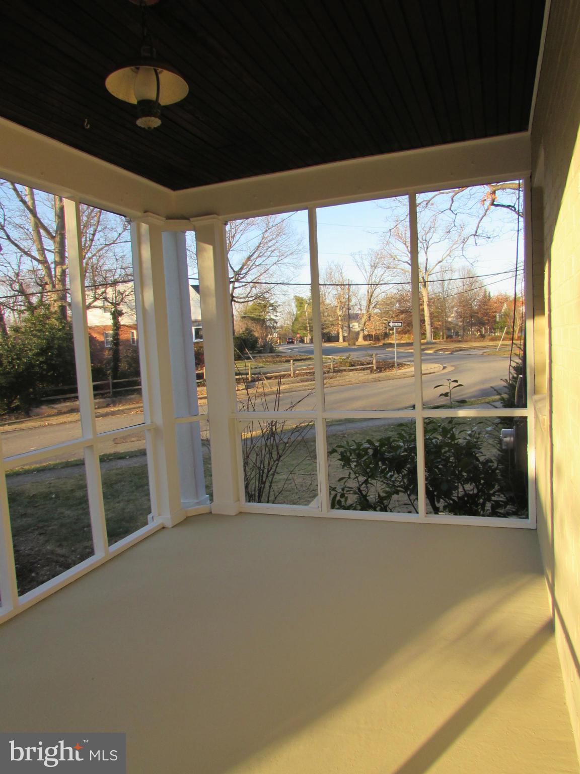 2026 Scroggins Road Alexandria, VA 22302 - Photo 16 of 17 spacious screen porch off living room