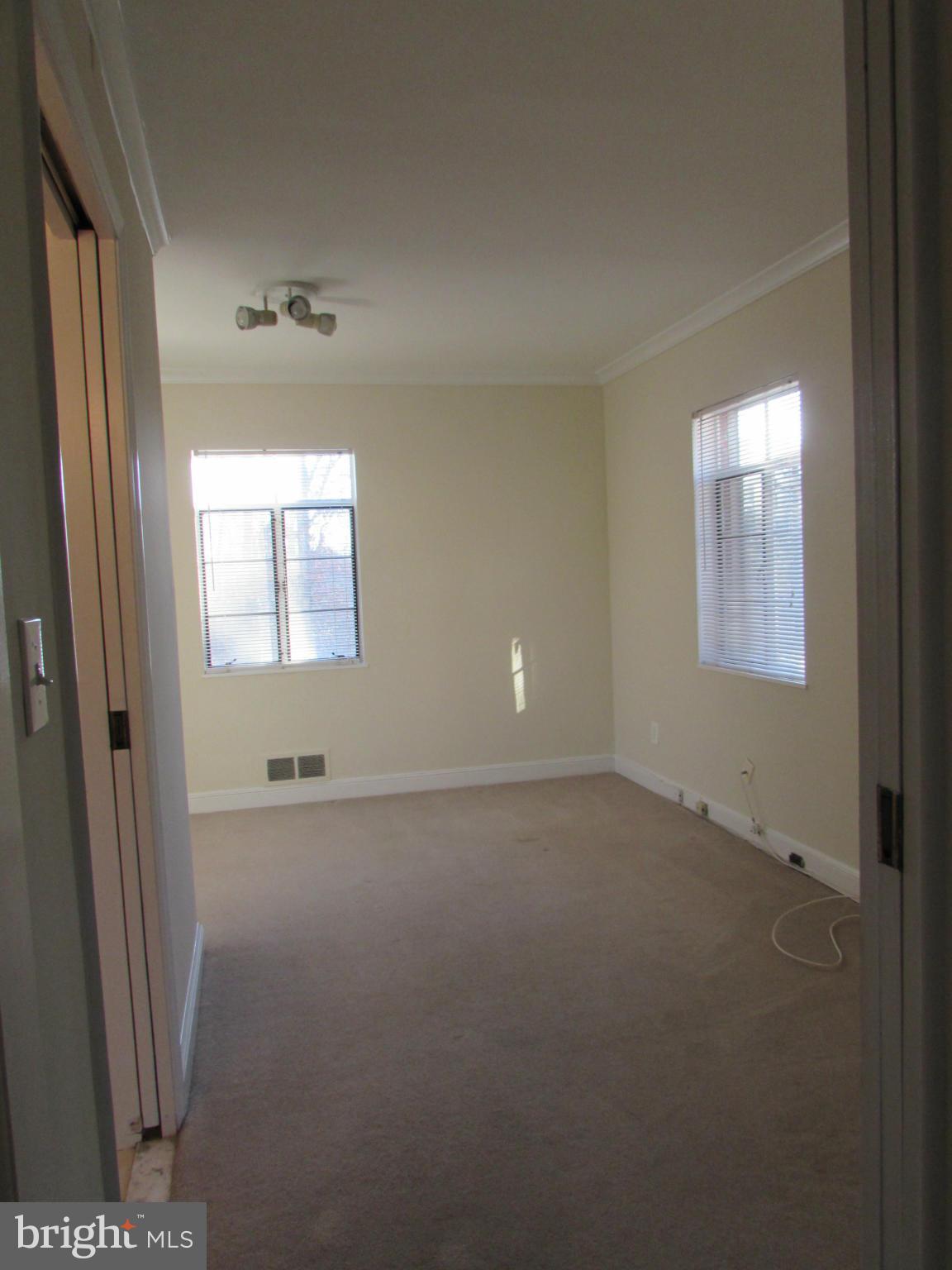 2026 Scroggins Road Alexandria, VA 22302 - Photo 8 of 17 main level den/family room w/full bath