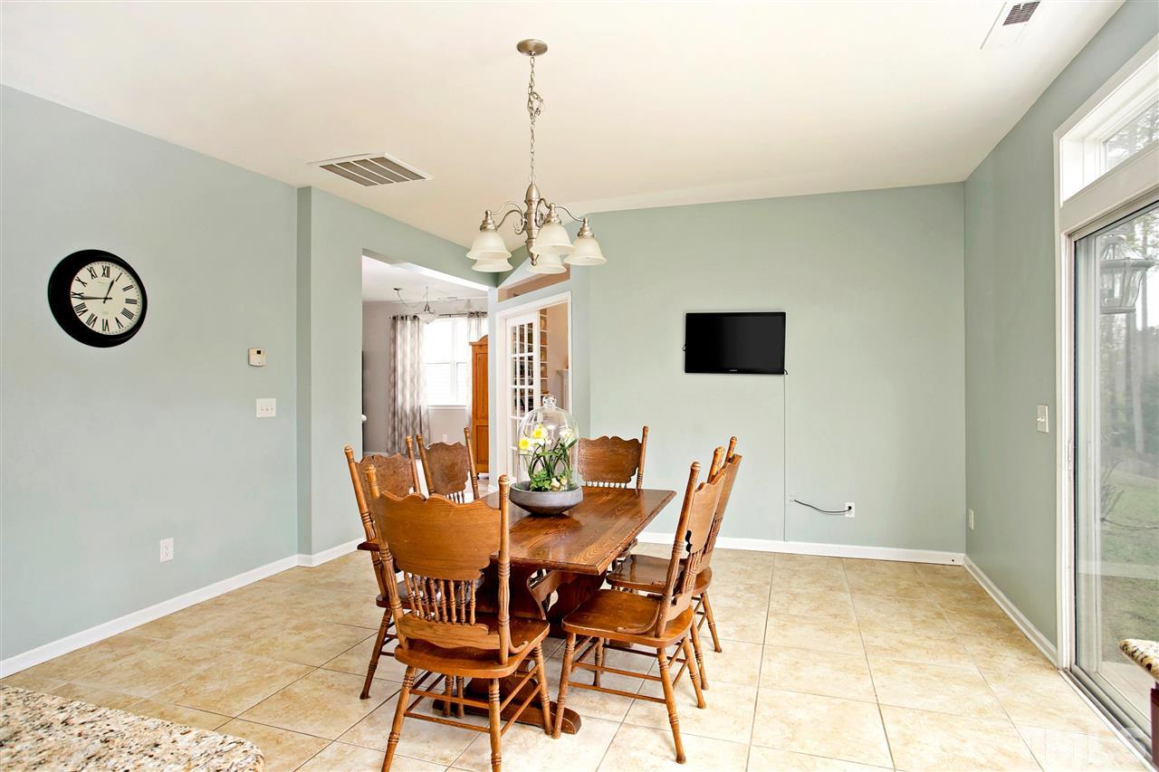 Large Center Island frames the storage of your dream with all these cabinets.  Kitchen has Granite Counter tops & top hat and Pendant lighting.  Gas Range for someone who loves to cook.