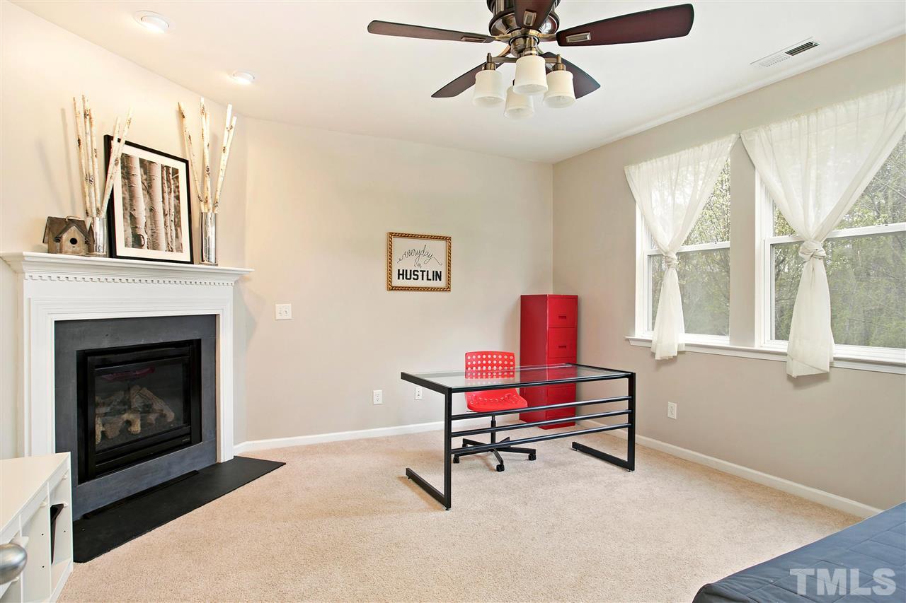 312 Rondelay Drive Durham, NC 27703 - Photo 8 of 25 This private room comes with Glass French Doors. Used as a Home Office currently. The Gas Fireplace and Stunning Mantel and Built in bookshelf s enhance this special space.