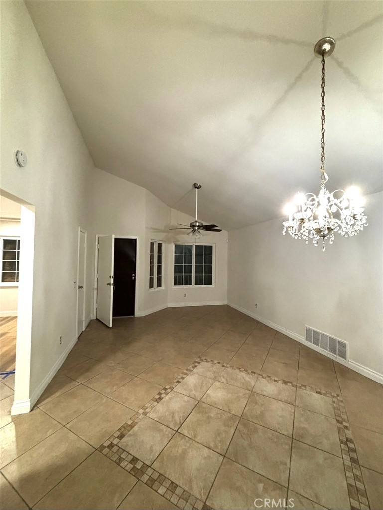 1164 Massachusetts Avenue Riverside, CA 92507 - Photo 4 of 14 a view of a livingroom with a chandelier