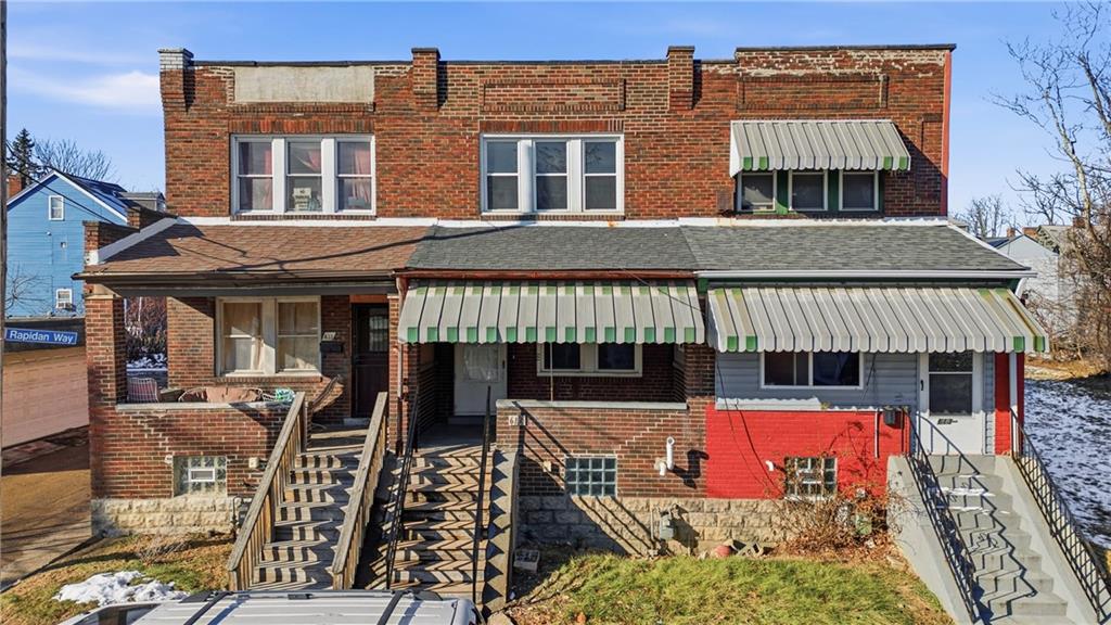 a view of a building with swimming pool