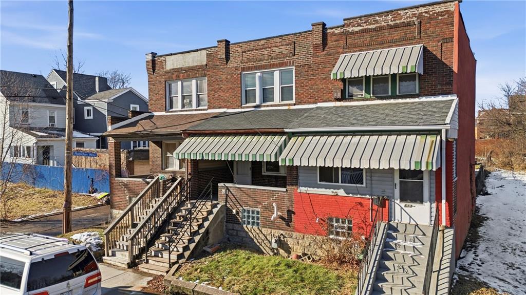 613 Paulson Avenue Pittsburgh, PA 15206 - Photo 2 of 32 a view of a roof deck with chair and wooden floor