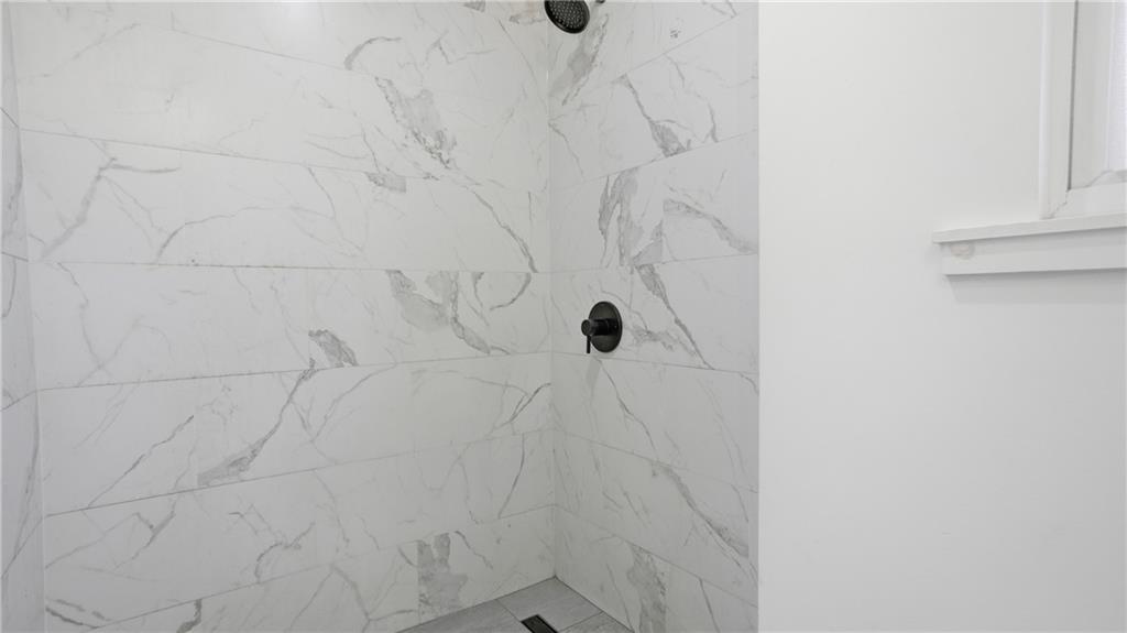 613 Paulson Avenue Pittsburgh, PA 15206 - Photo 27 of 32 a bathroom with a shower