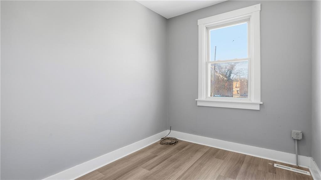 613 Paulson Avenue Pittsburgh, PA 15206 - Photo 28 of 32 a view of an empty room with a window