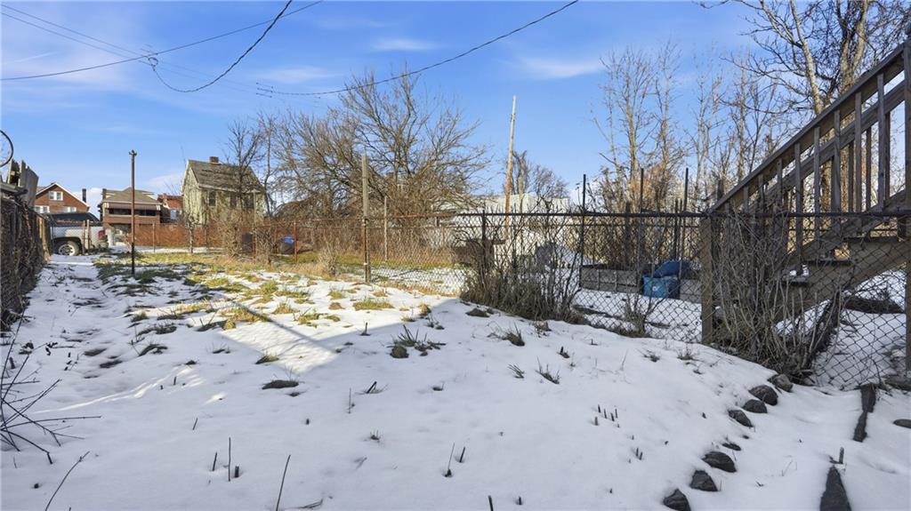 613 Paulson Avenue Pittsburgh, PA 15206 - Photo 30 of 32 a view of a backyard of the house