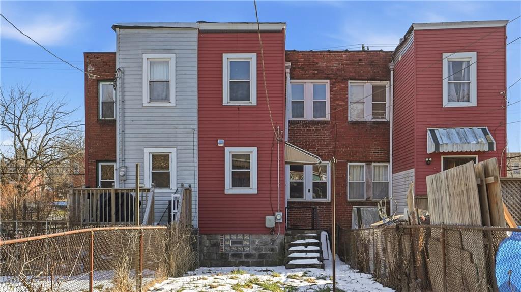 613 Paulson Avenue Pittsburgh, PA 15206 - Photo 32 of 32 a front view of a house with a yard