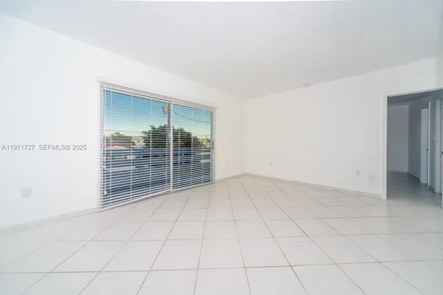 a bedroom with a bed and a table in it