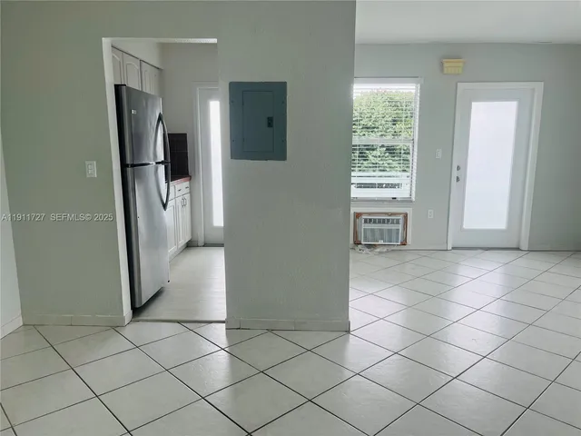 a kitchen with a stove and a microwave