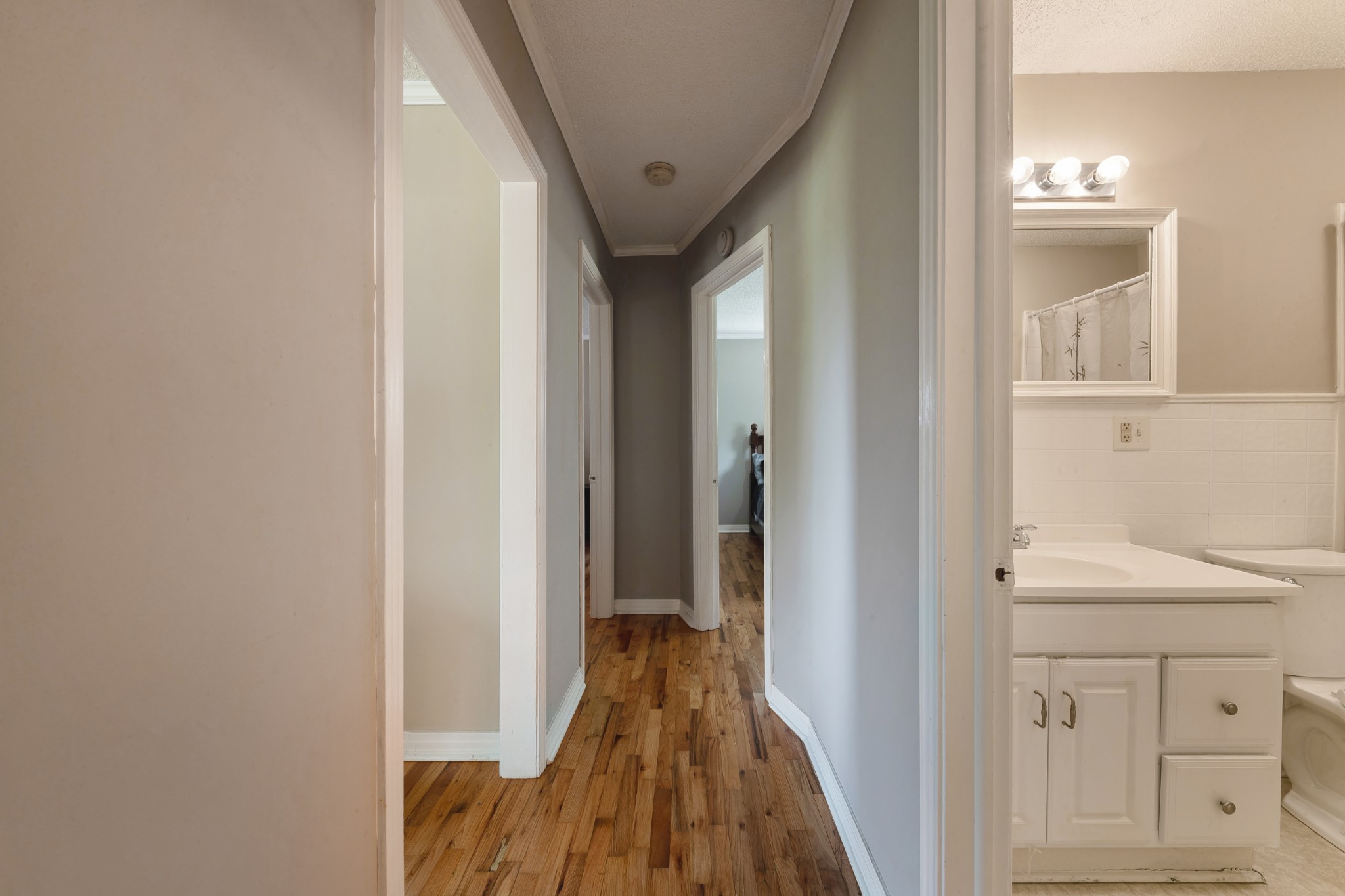 1265 Iron Bridge Road Columbia, TN 38401 - Photo 17 of 34 a view of a hallway with wooden floor and staircase