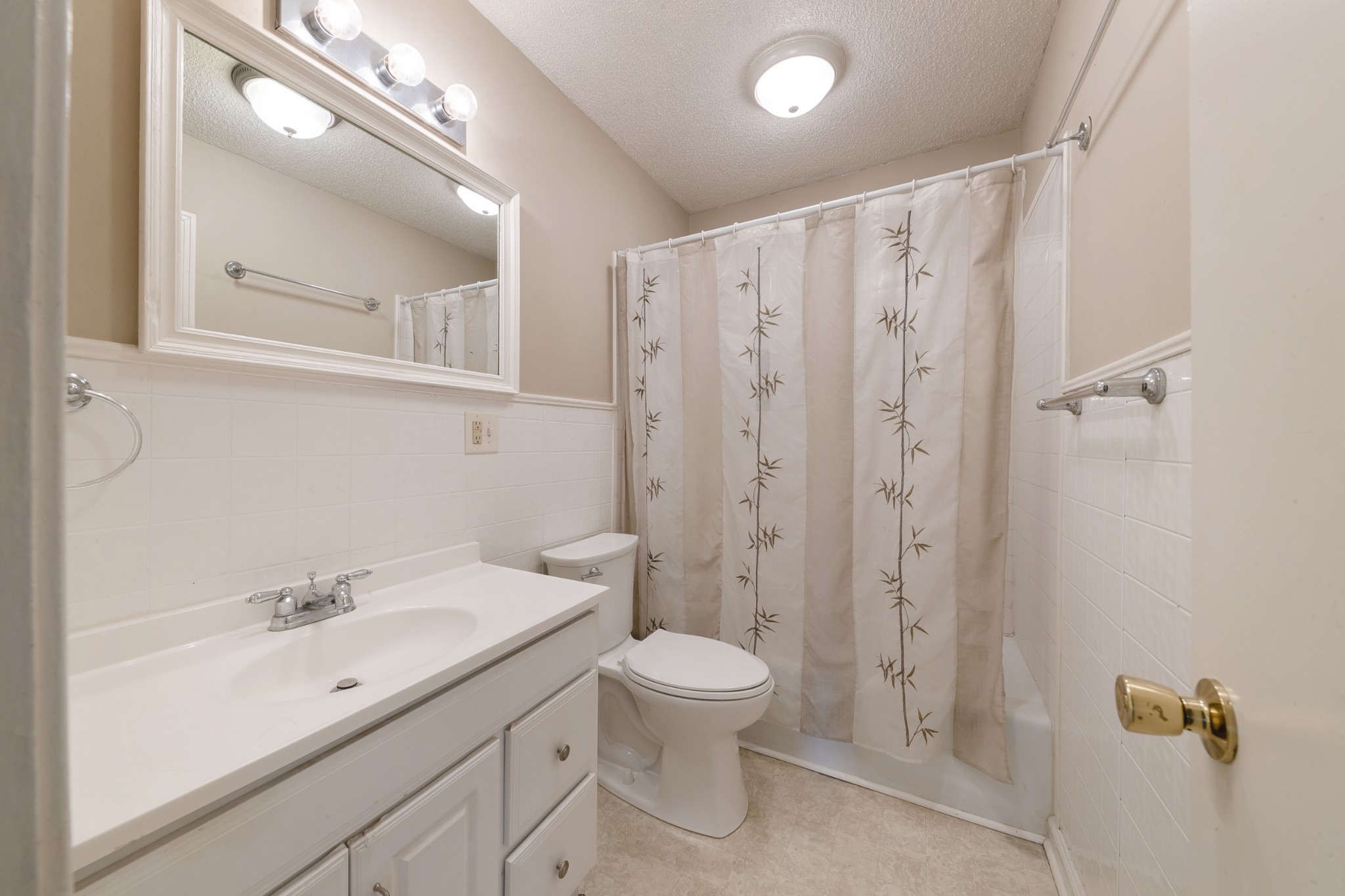 1265 Iron Bridge Road Columbia, TN 38401 - Photo 18 of 34 a bathroom with a toilet sink shower and mirror