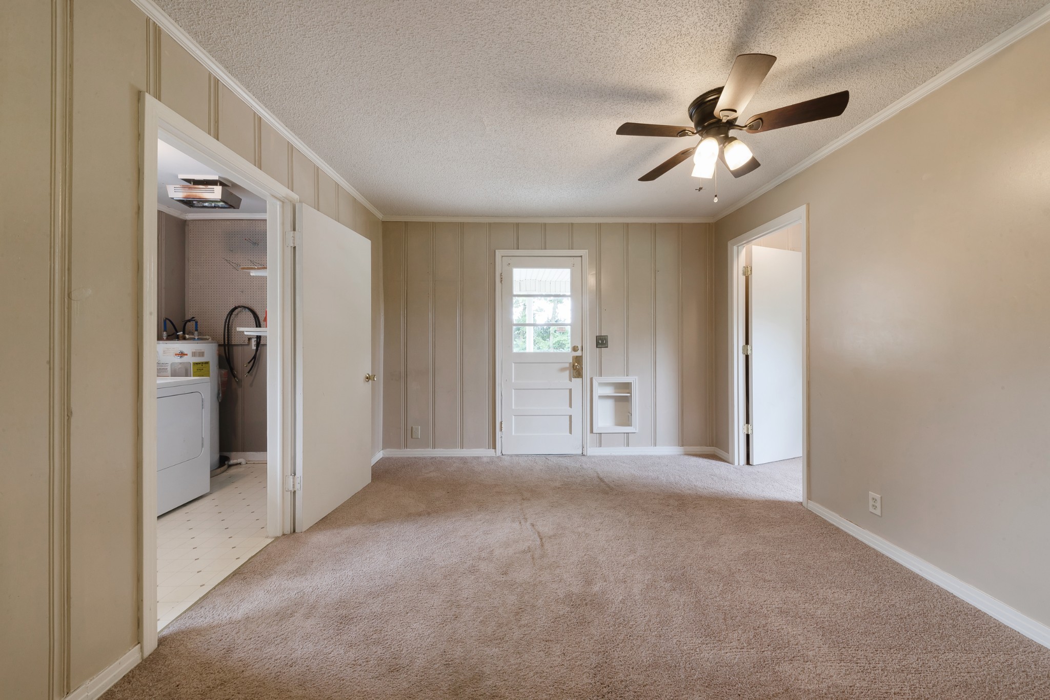 1265 Iron Bridge Road Columbia, TN 38401 - Photo 21 of 34 a view of a livingroom with a chandelier fan and windows