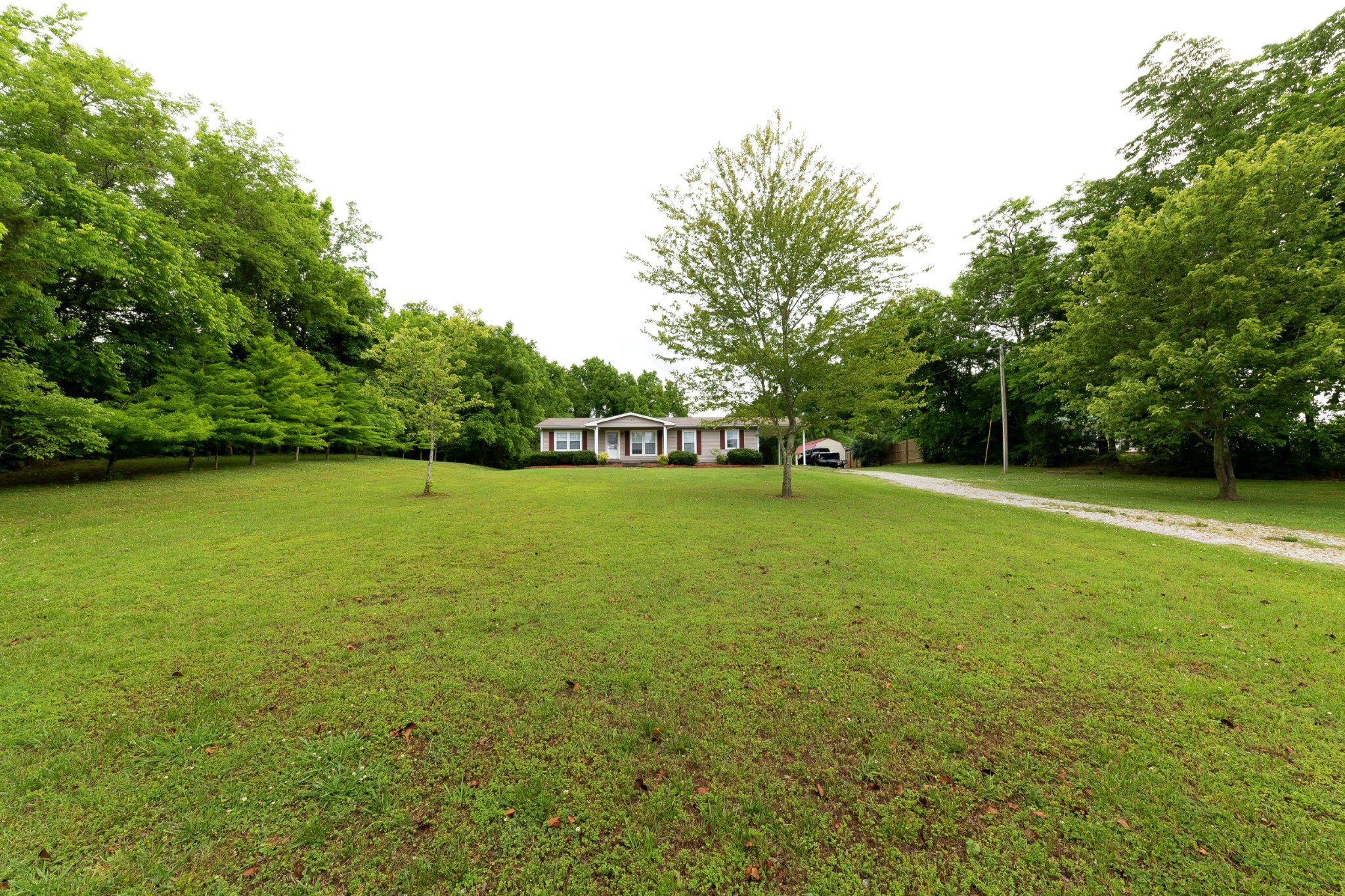1265 Iron Bridge Road Columbia, TN 38401 - Photo 4 of 34 a view of a field with a trees