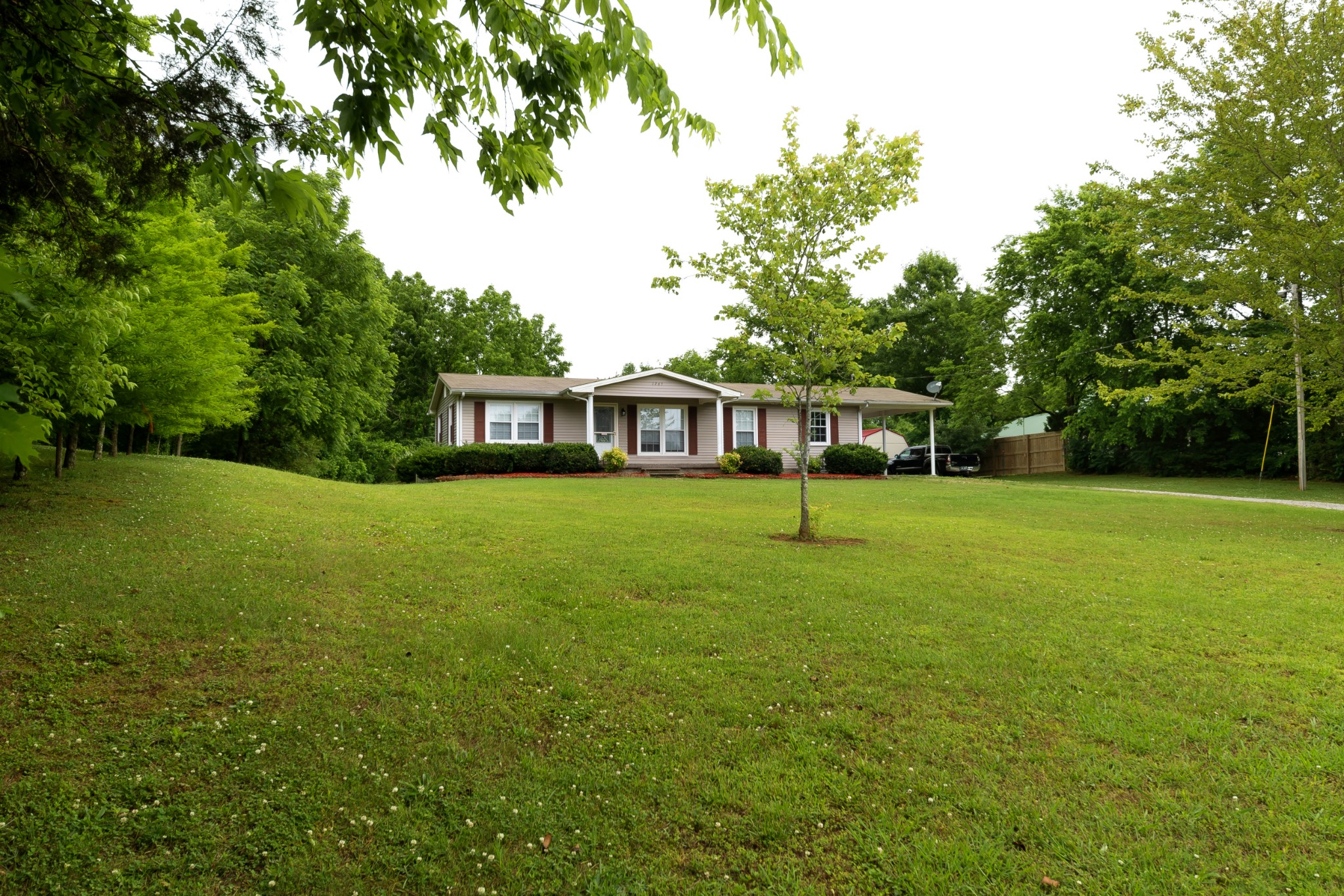 1265 Iron Bridge Road Columbia, TN 38401 - Photo 5 of 34 a view of a house with a big yard