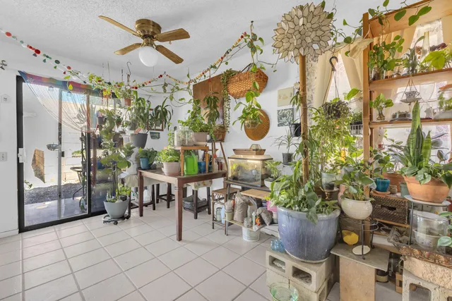 a kitchen with stainless steel appliances white cabinets and refrigerator