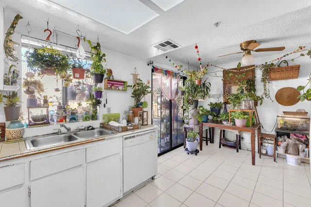 a view of a swimming pool with a patio