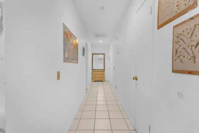 a bed room with a bed and a fish tank