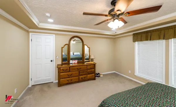 a room with closet and chandelier