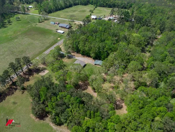 a view of a street with a park