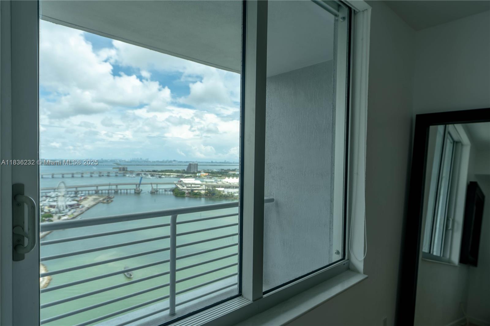 335 South Biscayne Boulevard, Unit 3410 Miami, FL 33131 - Photo 32 of 51 a view of a balcony next to a yard