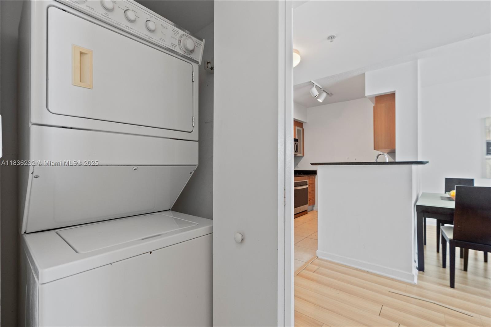 335 South Biscayne Boulevard, Unit 3410 Miami, FL 33131 - Photo 36 of 51 a utility room with dryer and washer