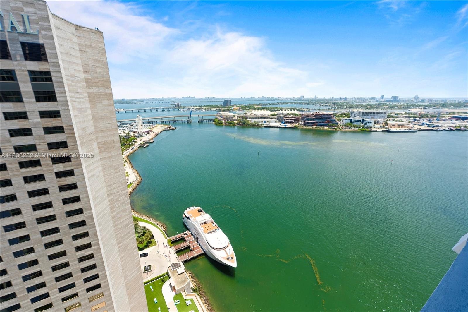 335 South Biscayne Boulevard, Unit 3410 Miami, FL 33131 - Photo 4 of 51 a view of a lake with building in front of it