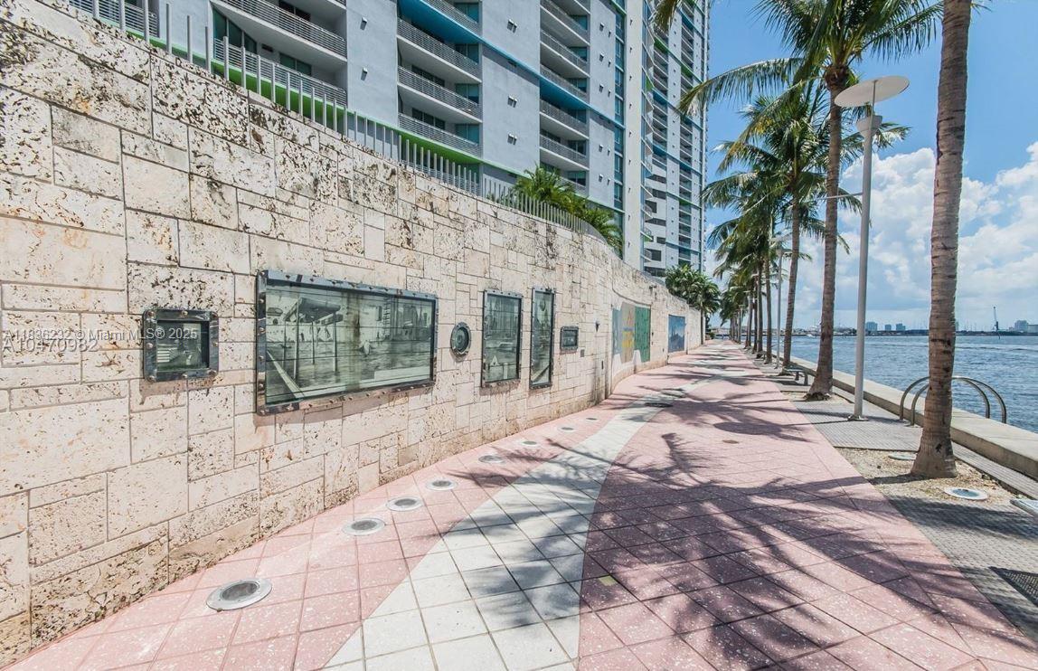 335 South Biscayne Boulevard, Unit 3410 Miami, FL 33131 - Photo 41 of 51 a view of a house with a yard